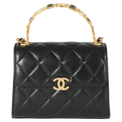 chanel black lambskin clutch with chain|More.